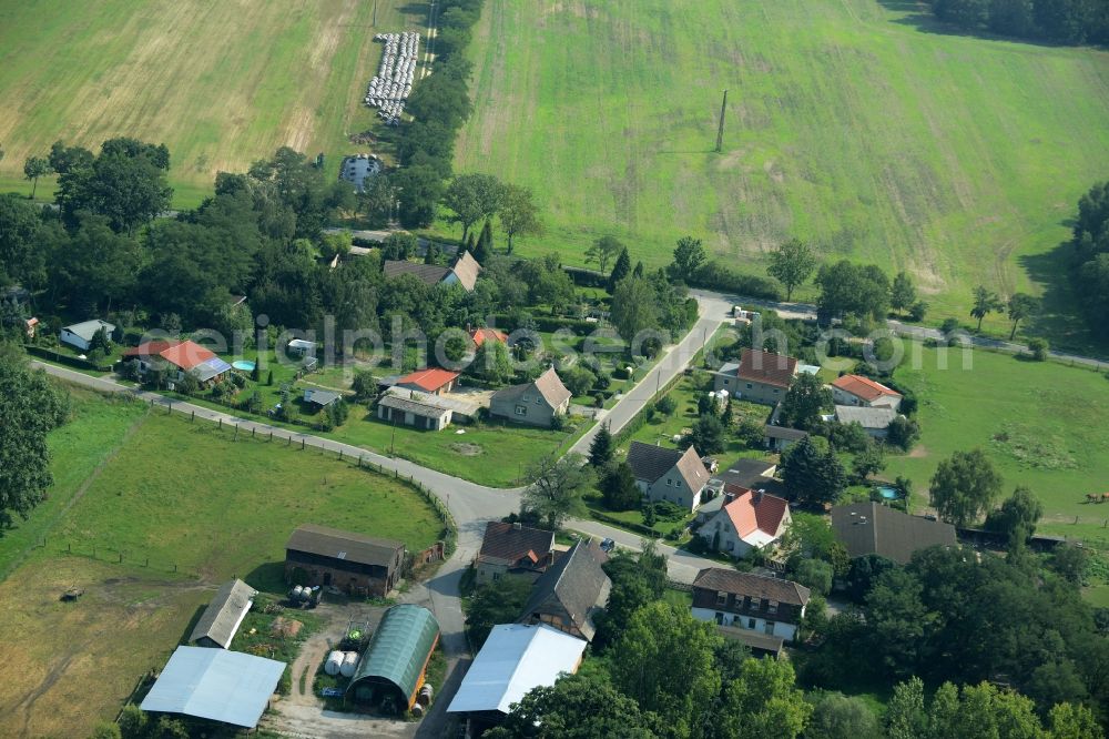 Aerial photograph Körbin-Alt - View of the hamlet of Koerbin-Alt in the state of Saxony-Anhalt. Farms and residential buildings are located on the street of the same name