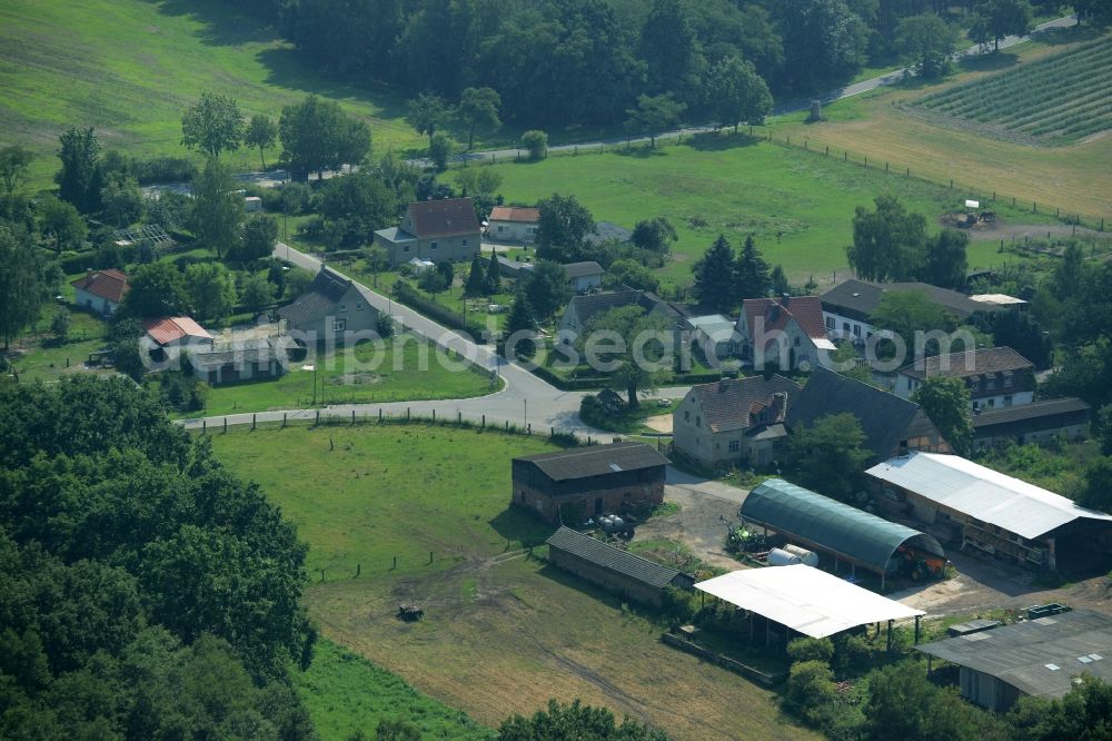 Aerial image Körbin-Alt - View of the hamlet of Koerbin-Alt in the state of Saxony-Anhalt. Farms and residential buildings are located on the street of the same name