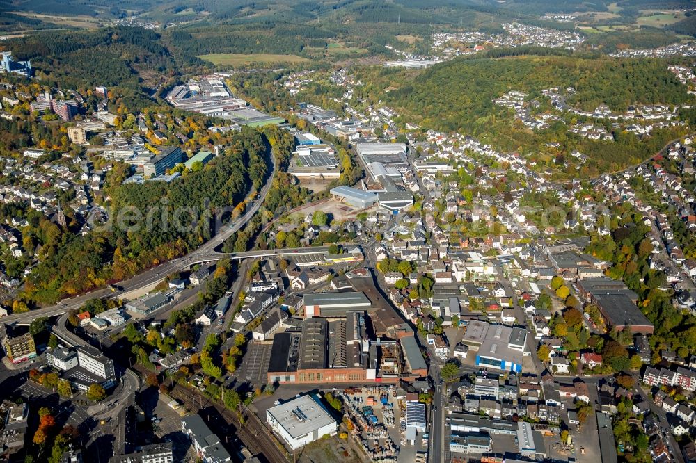 Siegen from above - Town View of the streets and houses of the residential areas in Siegen in the state North Rhine-Westphalia. You can see the federal road B62 the University of Siegen and business areas