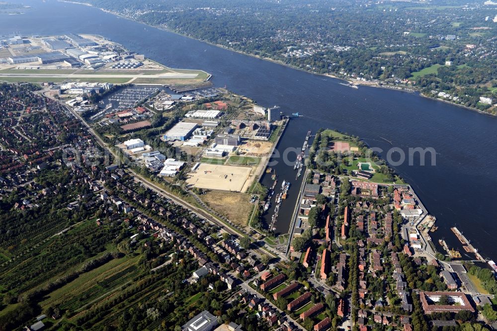 Aerial photograph Hamburg - Town View of the streets and houses of the residential areas in the city district Finkenwerder by the river- side of Elbe in Hamburg in Germany