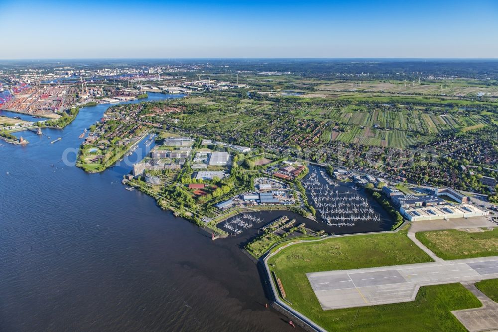 Aerial image Hamburg - Town View of the streets and houses of the residential areas in the city district Finkenwerder by the river- side of Elbe in Hamburg in Germany