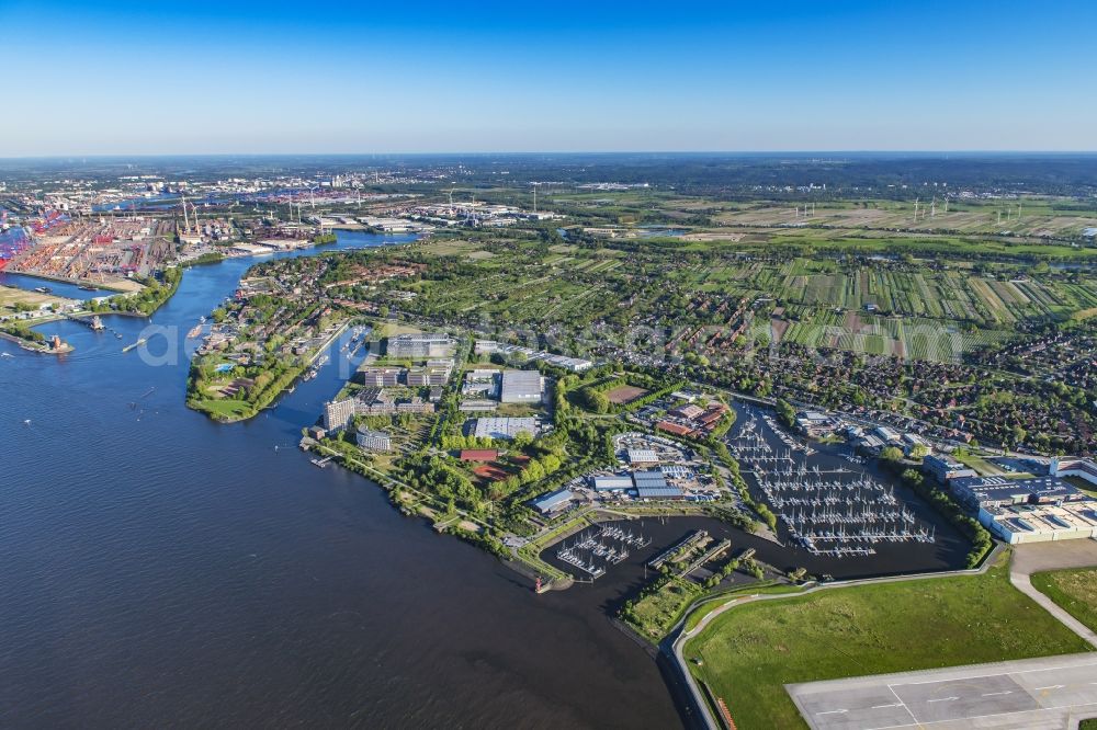 Aerial photograph Hamburg - Town View of the streets and houses of the residential areas in the city district Finkenwerder by the river- side of Elbe in Hamburg in Germany