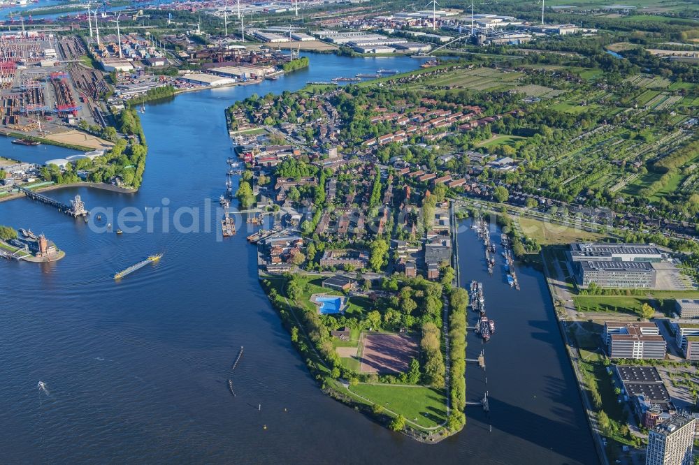 Hamburg from above - Town View of the streets and houses of the residential areas in the city district Finkenwerder by the river- side of Elbe in Hamburg in Germany