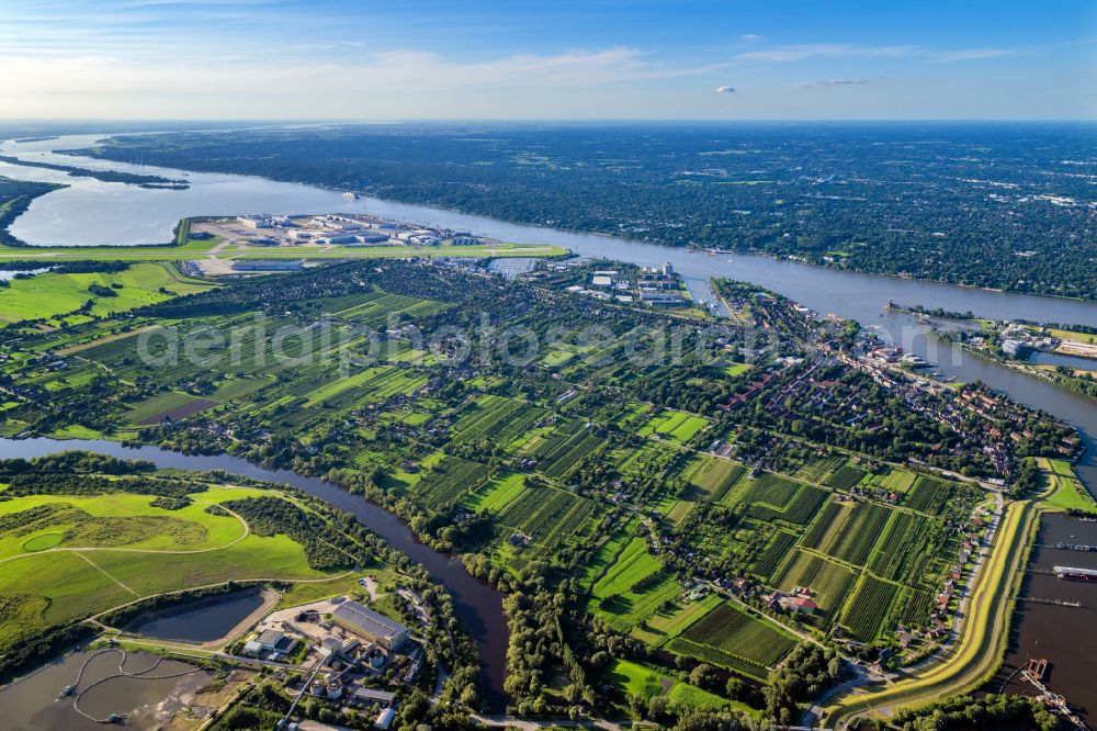 Hamburg from the bird's eye view: Town View of the streets and houses of the residential areas in the city district Finkenwerder by the river- side of Elbe in Hamburg in Germany