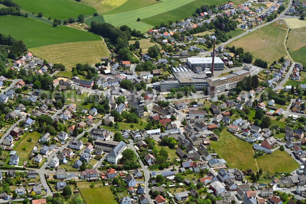 Stammbach from above - Town View of the streets and houses of the residential areas in Stammbach in the state Bavaria, Germany