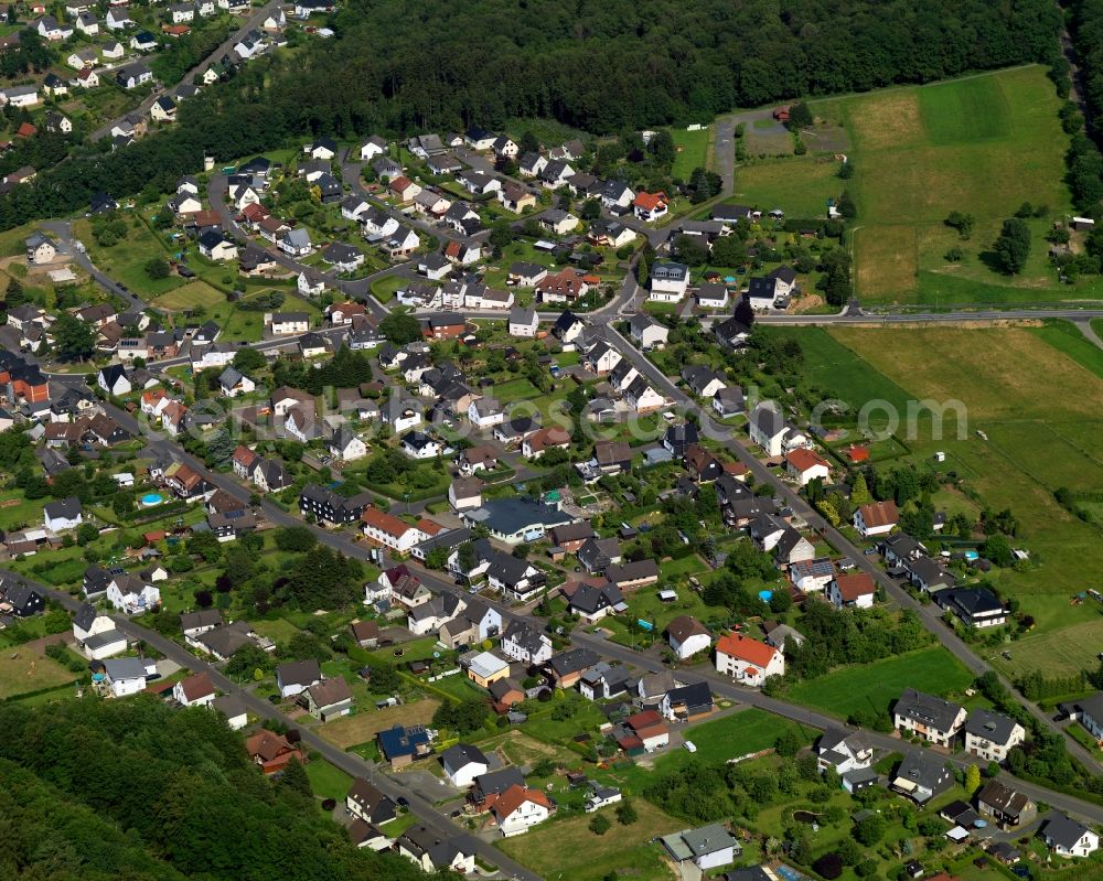 Aerial photograph Steinebach - View of Steinebach in the state of Rhineland-Palatinate. Steinebach is located in a valley of the river Sieg. It is an official tourist resort. Steinebach consists of residential areas and a business park. It is home to the mining pit Bindweide and the Westerwald Museum