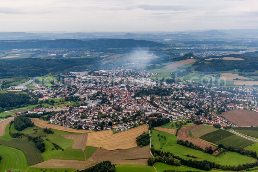 Stockach from the bird's eye view: Town View of the streets and houses of the residential areas in morning fog in Stockach in the state Baden-Wurttemberg, Germany