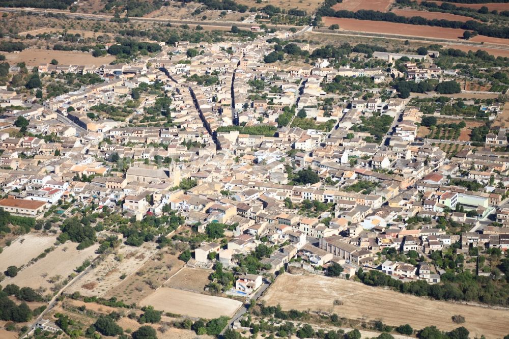 Aerial photograph Llubí - Town View of the streets and houses of the residential areas in LlubA? Mallorca in Balearic Islands, Spain