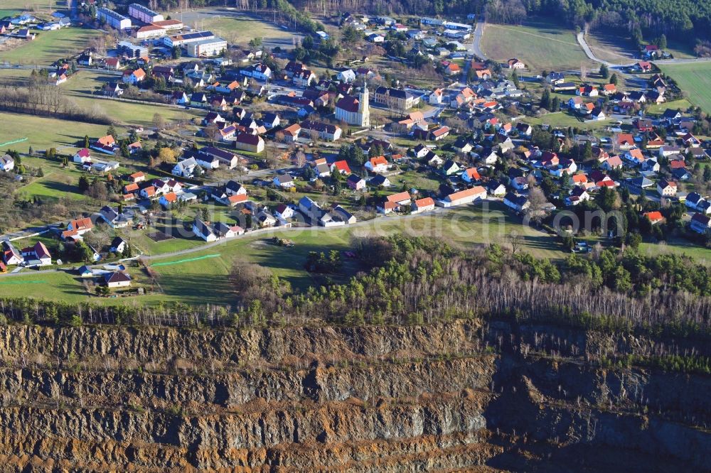 Oßling from above - Town View of the streets and houses of the residential areas in Ossling in the state Saxony, Germany