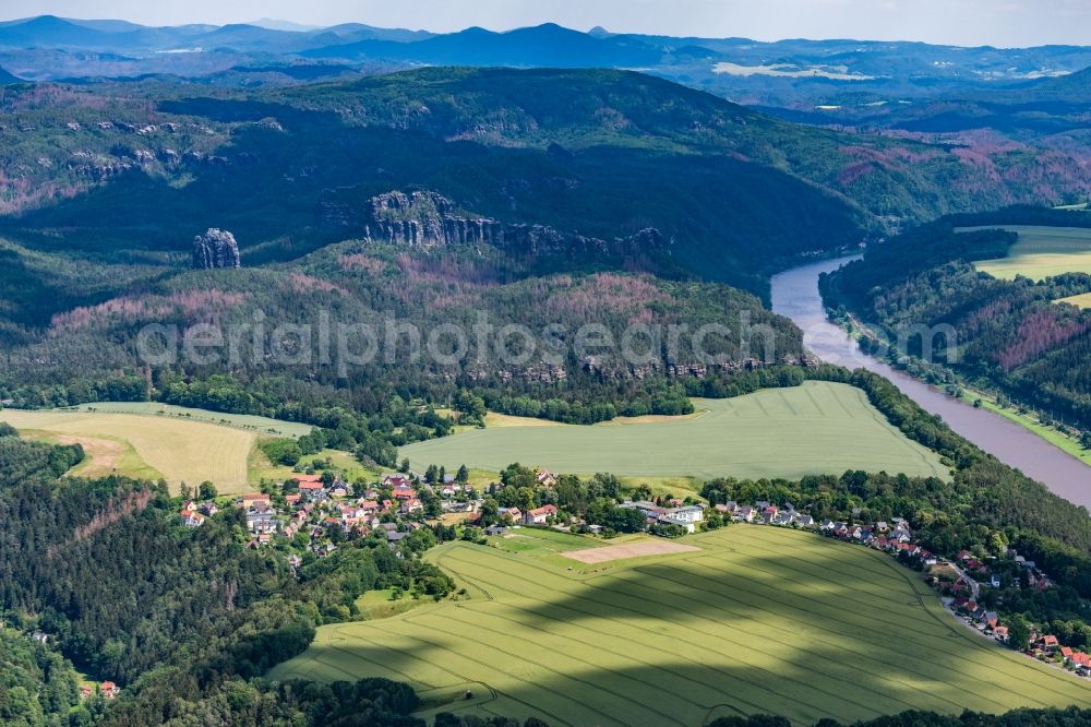 Ostrau from above - Town view of the streets and houses of the residential areas in the valley landscape of the Giant Mountains on the Elbe in Ostrau in the state Saxony, Germany