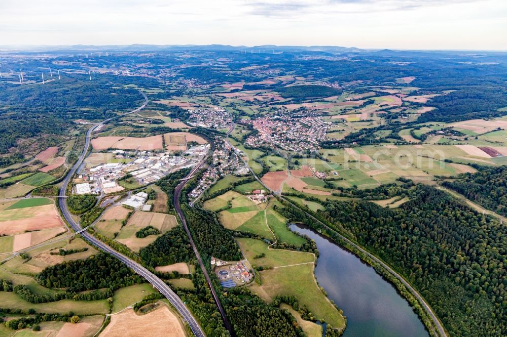 Steinau an der Straße from above - Location view of the streets and houses of residential areas in the valley landscape surrounded by mountains in Steinau an der Strasse in the state Hesse, Germany