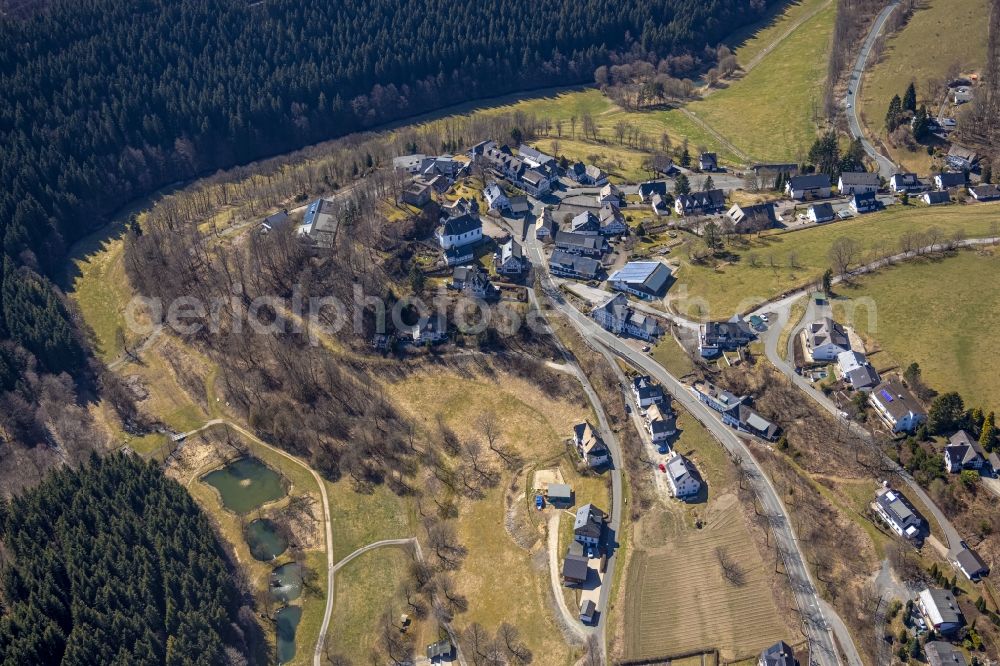 Aerial image Nordenau - Location view of the streets and houses of residential areas in the valley landscape surrounded by mountains in Nordenau at Sauerland in the state North Rhine-Westphalia, Germany