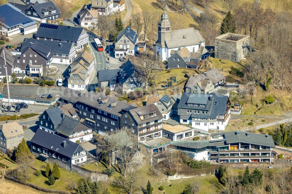 Aerial photograph Nordenau - Location view of the streets and houses of residential areas in the valley landscape surrounded by mountains in Nordenau at Sauerland in the state North Rhine-Westphalia, Germany