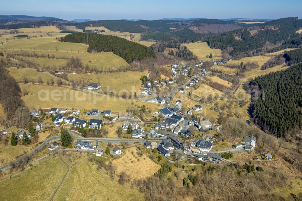 Nordenau from above - Location view of the streets and houses of residential areas in the valley landscape surrounded by mountains in Nordenau at Sauerland in the state North Rhine-Westphalia, Germany