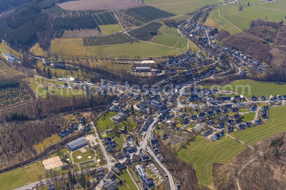 Oberkirchen from above - Location view of the streets and houses of residential areas in the valley landscape surrounded by mountains in Oberkirchen at Sauerland in the state North Rhine-Westphalia, Germany