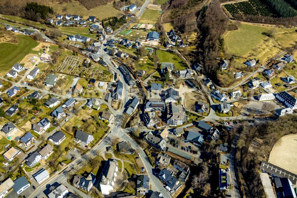 Oberkirchen from above - Location view of the streets and houses of residential areas in the valley landscape surrounded by mountains in Oberkirchen at Sauerland in the state North Rhine-Westphalia, Germany