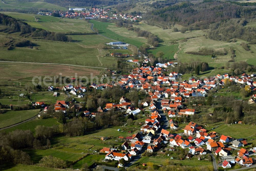 Oberweid from above - View of the streets and houses of the residential areas in the valley of the Rhoen community Oberweid in the state of Thuringia, Germany, which is surrounded by mountains