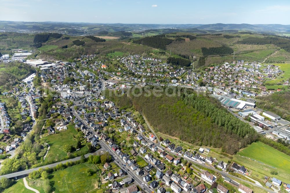 Aerial photograph Netphen - Location view of the streets and houses of residential areas in the valley landscape surrounded by mountains in the district Dreis-Tiefenbach in Netphen in the state North Rhine-Westphalia, Germany