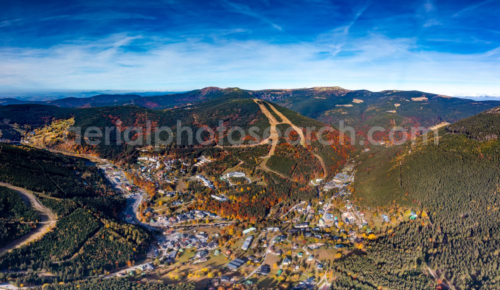 Spindleruv Mlyn - Spindlermühle from the bird's eye view: Location view of the streets and houses of residential areas in the valley landscape surrounded by mountains on street Skolni in Spindleruv Mlyn - Spindlermuehle in Kralovehradecky kraj - Boehmen, Czech Republic