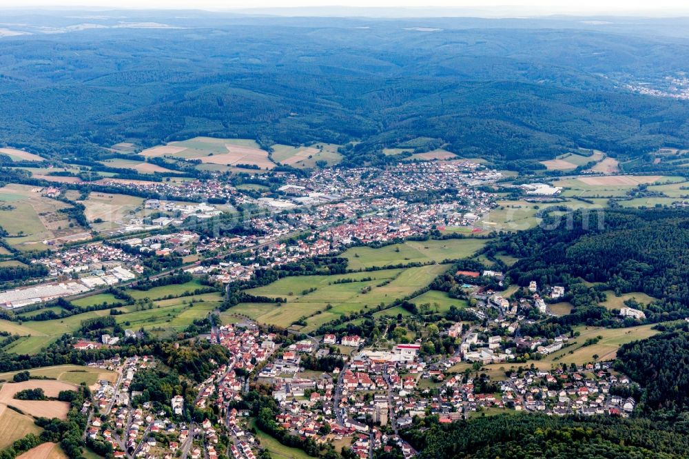 Aerial photograph Steinau an der Straße - Location view of the streets and houses of residential areas in the valley landscape surrounded by mountains in Steinau an der Strasse in the state Hesse, Germany