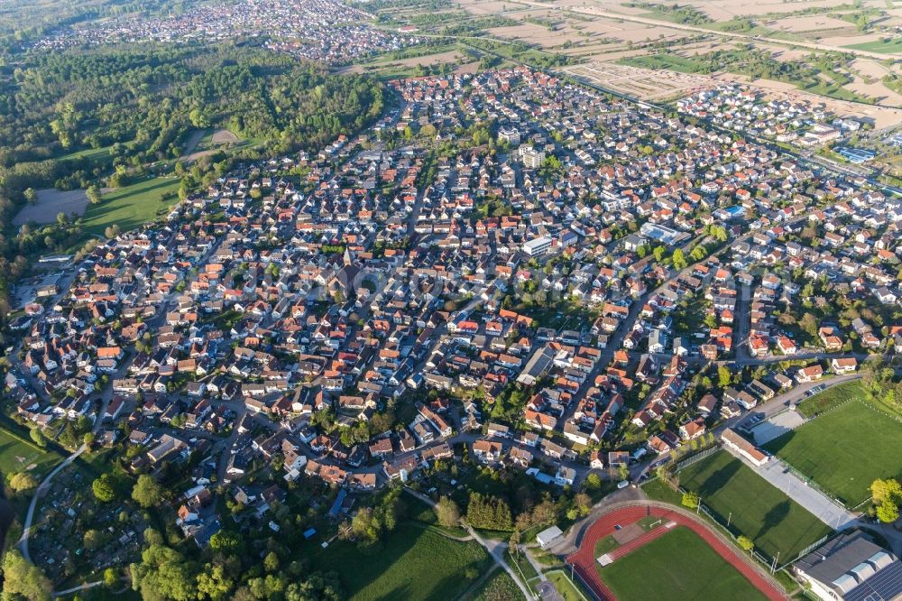 Ötigheim from the bird's eye view: Town View of the streets and houses of the residential areas in Oetigheim in the state Baden-Wuerttemberg, Germany