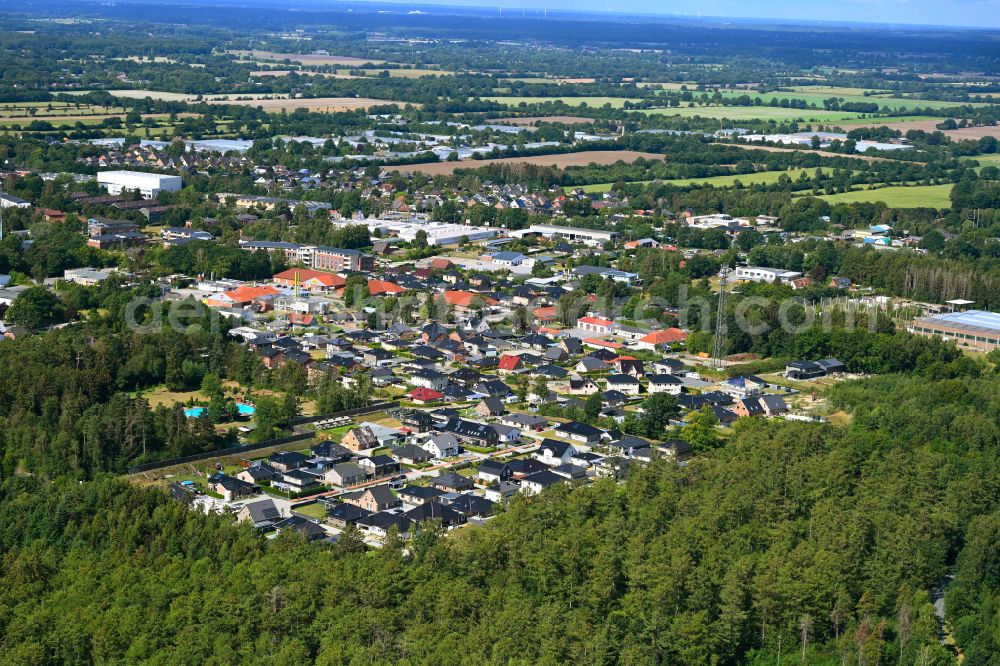 Trappenkamp from the bird's eye view: Town View of the streets and houses of the residential areas in Trappenkamp in the state Schleswig-Holstein, Germany