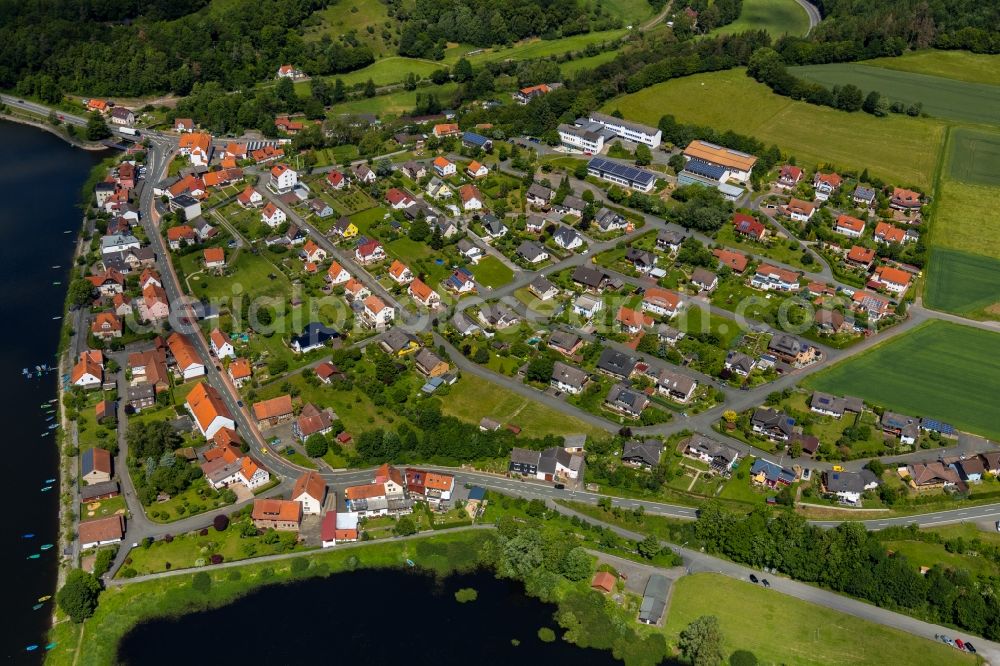 Herzhausen from the bird's eye view: City view on the bank of the Eder in Herzhausen in the state of Hesse, Germany