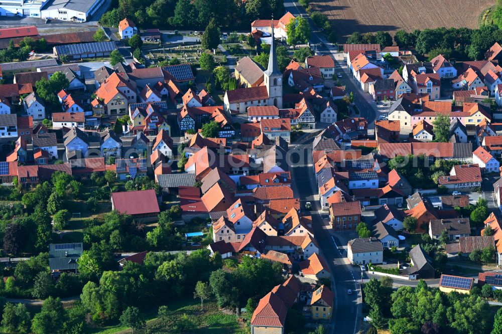 Unsleben from the bird's eye view: Town View of the streets and houses of the residential areas in Unsleben in the state Bavaria, Germany