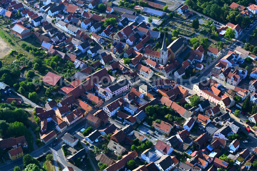 Unsleben from above - Town View of the streets and houses of the residential areas in Unsleben in the state Bavaria, Germany