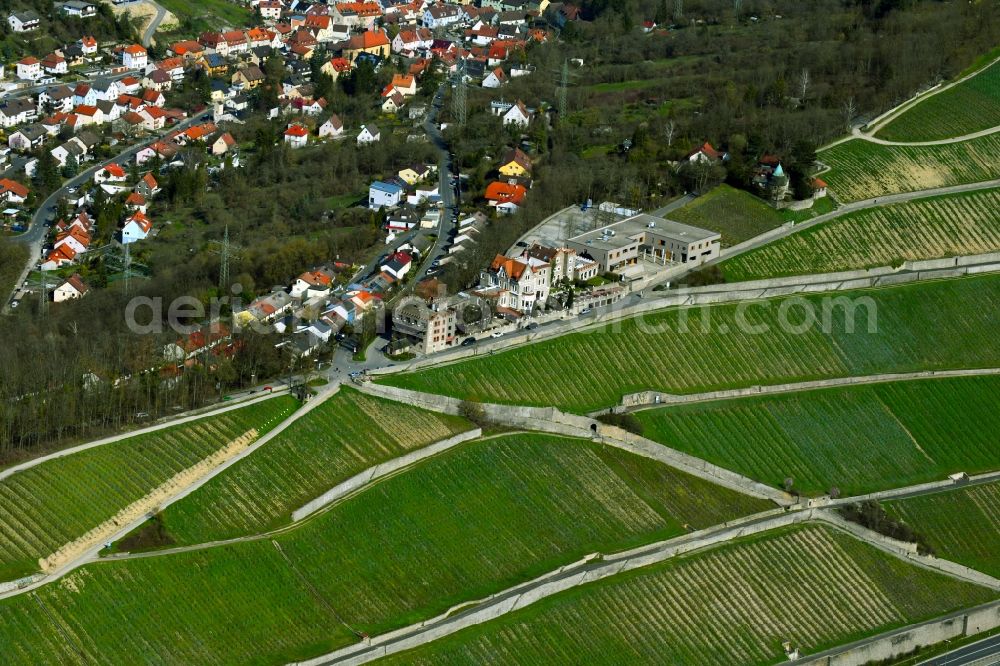 Aerial photograph Unterdürrbach - View of the streets and houses of the residential areas in Unterduerrbach with vineyards in the state Bavaria, Germany