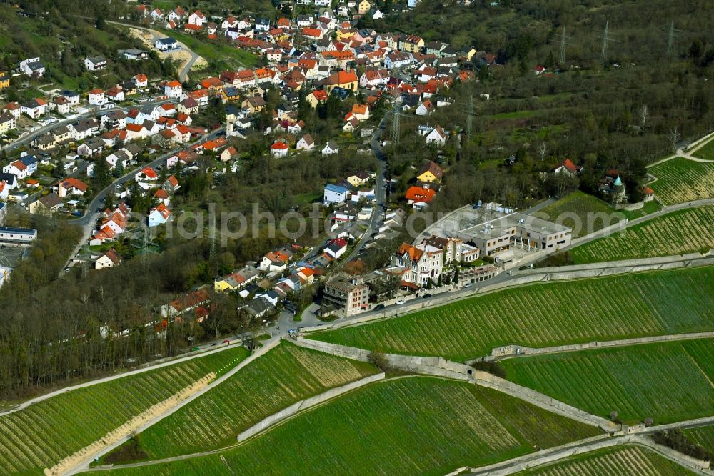 Unterdürrbach from above - View of the streets and houses of the residential areas in Unterduerrbach with vineyards in the state Bavaria, Germany