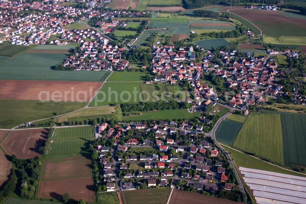 Aerial image Unterpleichfeld - Town View of the streets and houses of the residential areas in Unterpleichfeld in the state Bavaria, Germany