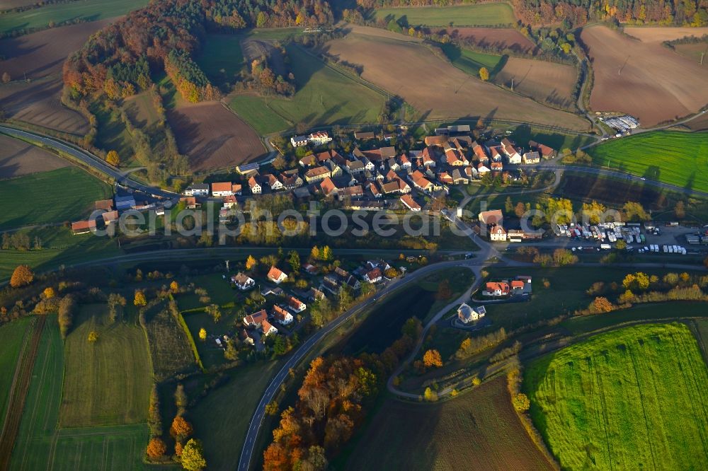 Aerial photograph Voccawind - View of the village of Voccawind in the state of Bavaria. Voccawind is located in the county district of Hassberge and is surrounded by agricultural fields