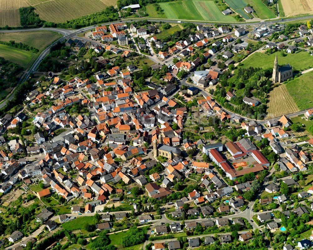 Waldböckelheim from above - View of Waldboeckelheim in the state of Rhineland-Palatinate. The tourist resort Waldboeckelheim is a borough and municipiality in the county district of Bad Kreuznach. It is surrounded three inactive volcanos, consists of several smaller hamlets and settlements and is surrounded by agricultural land