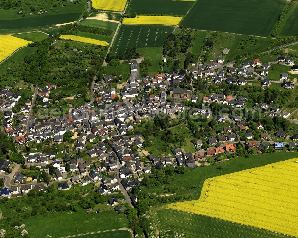 Waldorf from the bird's eye view: View of the borough of Waldorf in the state of Rhineland-Palatinate. The borough is part of the administrative district of Bad Breisig and is surrounded by agricultural fields and rapeseed fields. The Vinxtbach creek takes its course through the locality