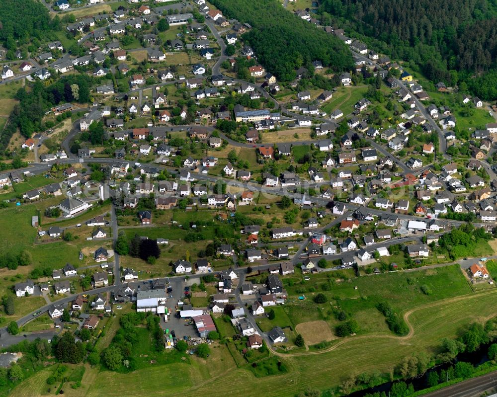 Wallmenroth from above - View of Wallmenroth in the state of Rhineland-Palatinate. Wallmenroth is a borough and municipiality in the valley of the river Sieg. Its centre consists of residential areas with single family units and semi-detached houses. The borough is surrounded by forest and agricultural land