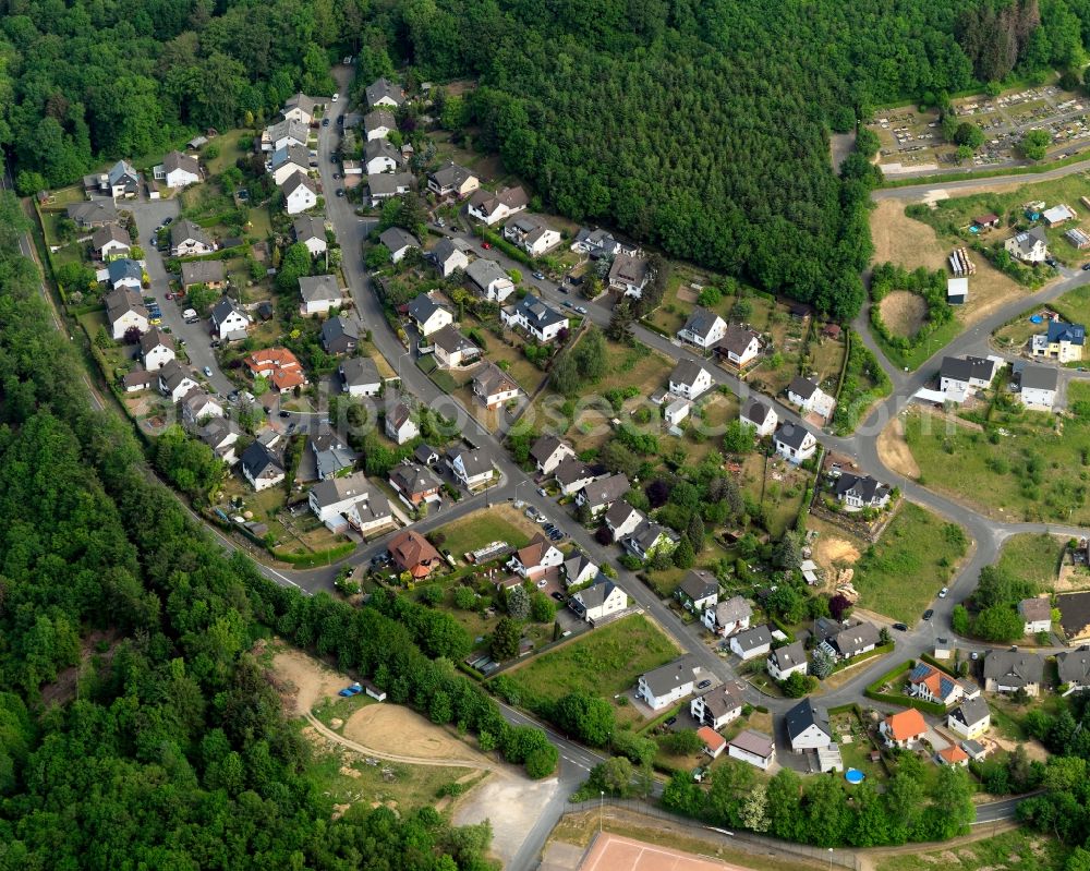 Wallmenroth from the bird's eye view: View of Wallmenroth in the state of Rhineland-Palatinate. Wallmenroth is a borough and municipiality in the valley of the river Sieg. Its centre consists of residential areas with single family units and semi-detached houses. The borough is surrounded by forest and agricultural land