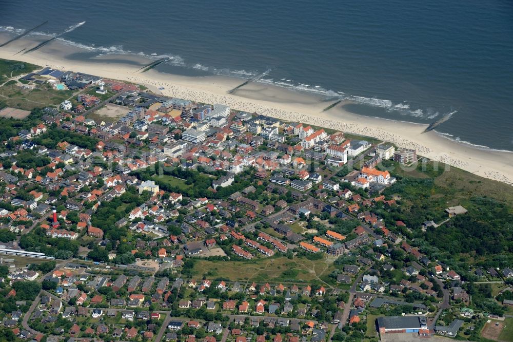 Wangerooge from the bird's eye view: View of the village of Wangerooge with its main beach on the island of the same name in the Wadden Sea of the North Sea in the state of Lower Saxony. Wangerooge is the Eastern-most inhabited of the East Frisian Islands. It has a sand beach and is a spa resort