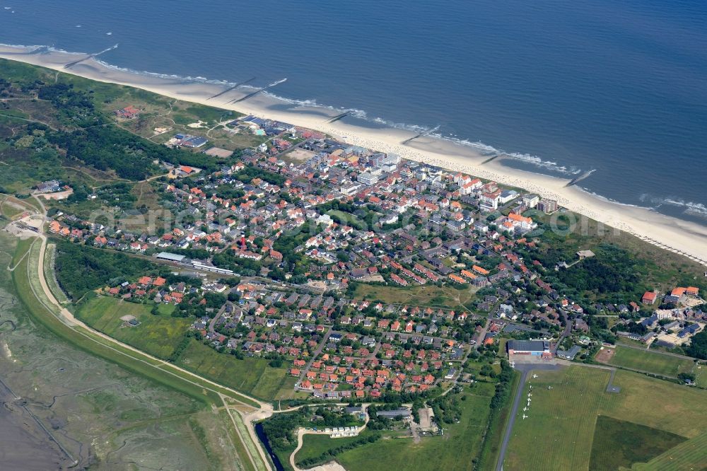 Wangerooge from the bird's eye view: View of the village of Wangerooge on the island of the same name in the Wadden Sea of the North Sea in the state of Lower Saxony. Wangerooge is the Eastern-most inhabited of the East Frisian Islands. It has a sand beach and is a spa resort