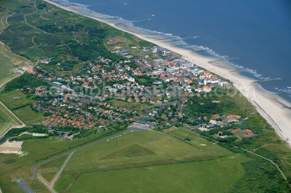 Wangerooge from the bird's eye view: View of the village of Wangerooge on the island of the same name in the Wadden Sea of the North Sea in the state of Lower Saxony. Wangerooge is the Eastern-most inhabited of the East Frisian Islands. It has a sand beach and is a spa resort