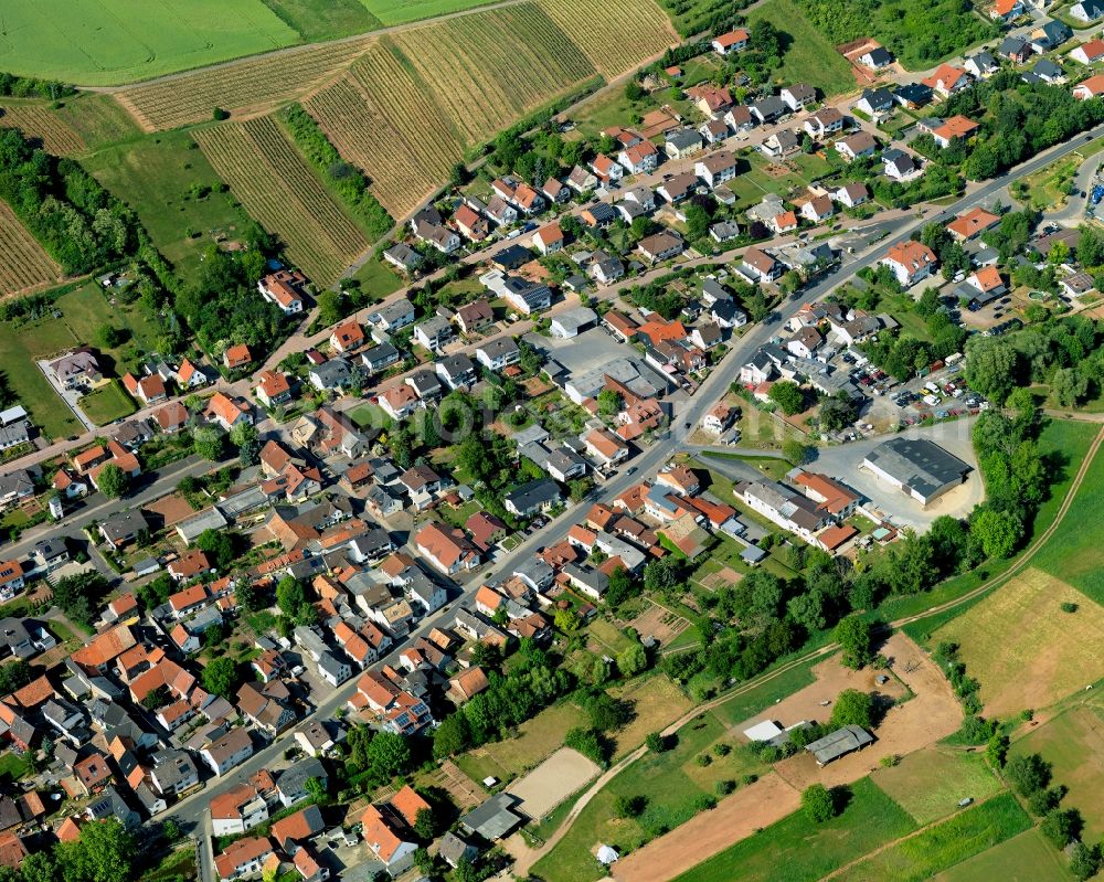 Aerial image Weinsheim - View of Weinsheim in the state of Rhineland-Palatinate. Weinsheim is a borough and municipiality in the county district of Bad Kreuznach. It is located in the Nature Park Soonwald-Nahe. The Ellerbach creek takes its course through the village. Weinsheim includes three hamlets, two churches and the old town hall. The borough mainly consists of single family homes and residential areas