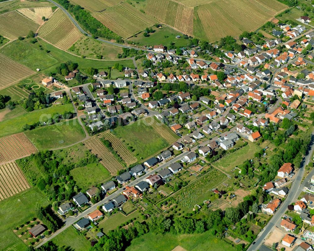 Weinsheim from above - View of Weinsheim in the state of Rhineland-Palatinate. Weinsheim is a borough and municipiality in the county district of Bad Kreuznach. It is located in the Nature Park Soonwald-Nahe. The Ellerbach creek takes its course through the village. Weinsheim includes three hamlets, two churches and the old town hall. The borough mainly consists of single family homes and residential areas