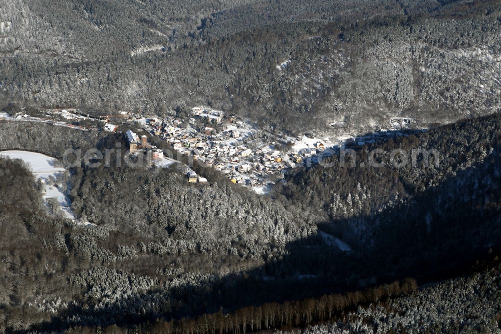 Schwarzburg from above - View of the wintry snow-covered village of Schwarzburg and the castle above the village in the state of Thuringia