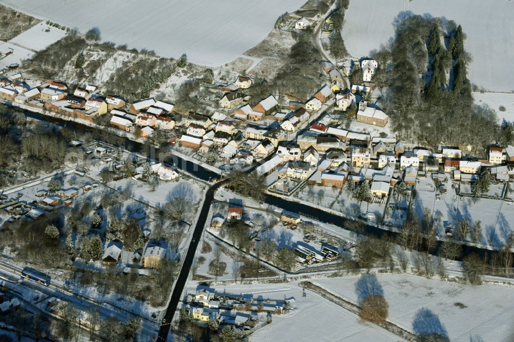 Niederfinow from above - View of the snow-covered winterly village of Niederfinow along the river of Old Finow in the state of Brandenburg