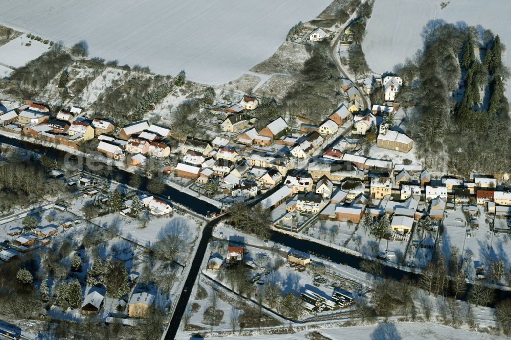 Niederfinow from the bird's eye view: View of the snow-covered winterly village of Niederfinow along the river of Old Finow in the state of Brandenburg