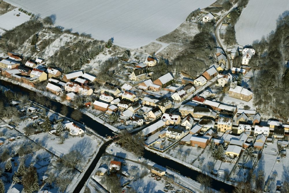 Niederfinow from the bird's eye view: View of the snow-covered winterly village of Niederfinow along the river of Old Finow in the state of Brandenburg