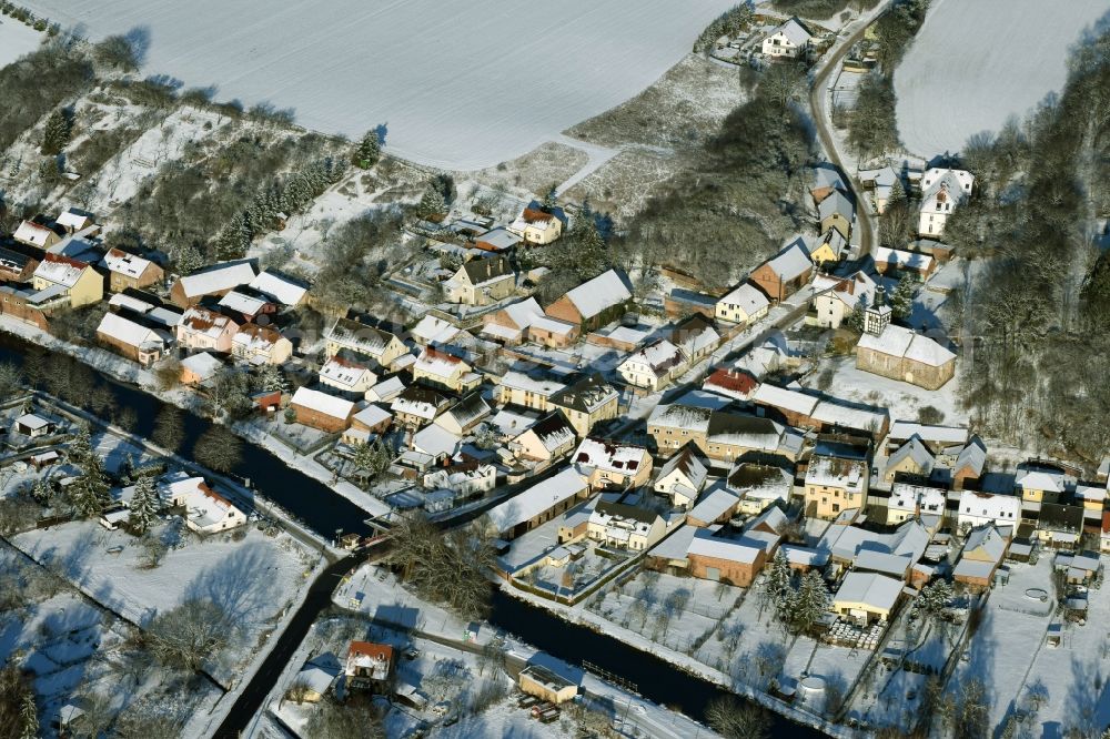 Aerial image Niederfinow - View of the snow-covered winterly village of Niederfinow along the river of Old Finow in the state of Brandenburg