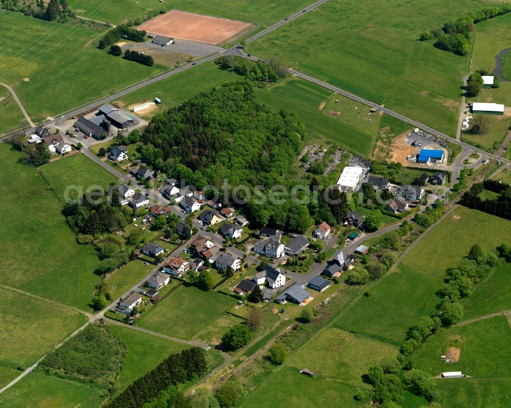 Niederroßbach from above - View of the hamlet of Bahnhof in the borough of Neustadt/Westerwald in the state of Rhineland-Palatinate. The borough is located in the county district and region of Westerwald. The residential village is surrounded by fields and meadows