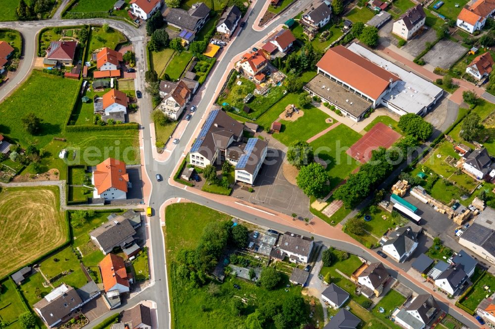 Aerial image Wrexen - Town View of the streets and houses of the residential areas in Wrexen in the state Hesse, Germany