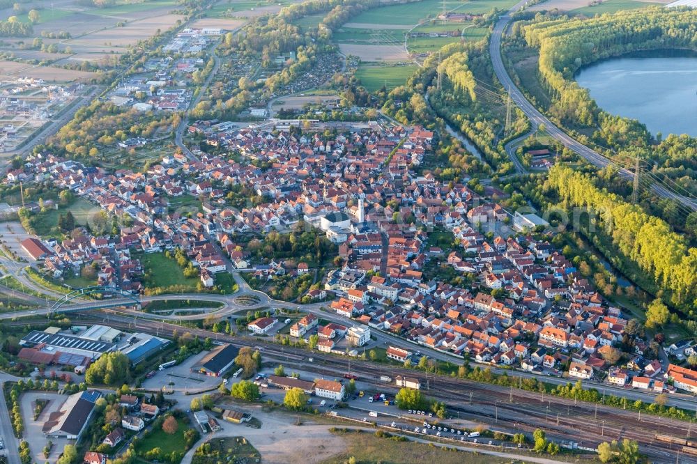 Wörth am Rhein from the bird's eye view: Town View of the streets and houses of the residential areas in Woerth am Rhein in the state Rhineland-Palatinate, Germany